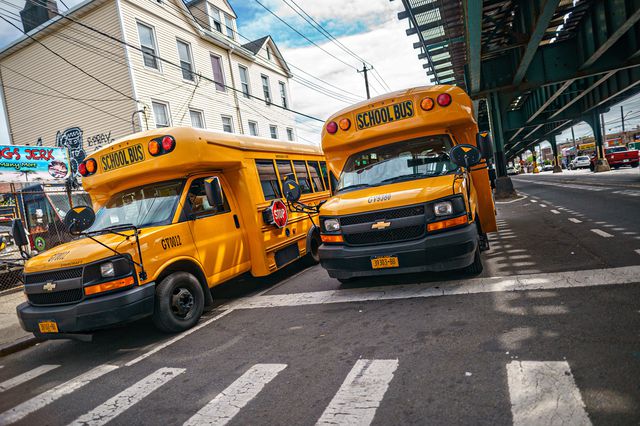 Two school buses in the Bronx, May 27th, 2021